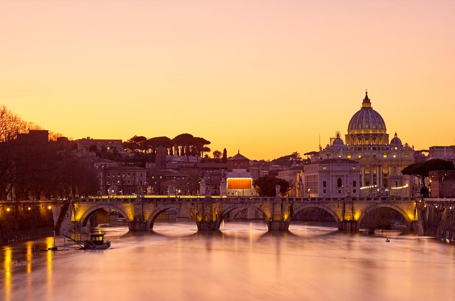 View of the Tiber river with bridge in Rome