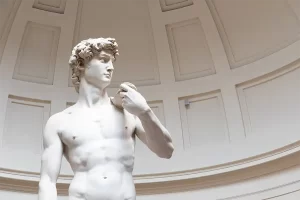 Close-up of Michelangelo’s statue of David inside the Galleria dell’Accademia in Florence.