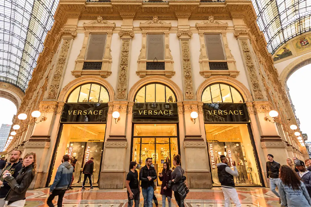 Versace store facade at Galleria Vittorio Emanuele II in Milan, a symbol of luxury and elegance in Italian fashion.
